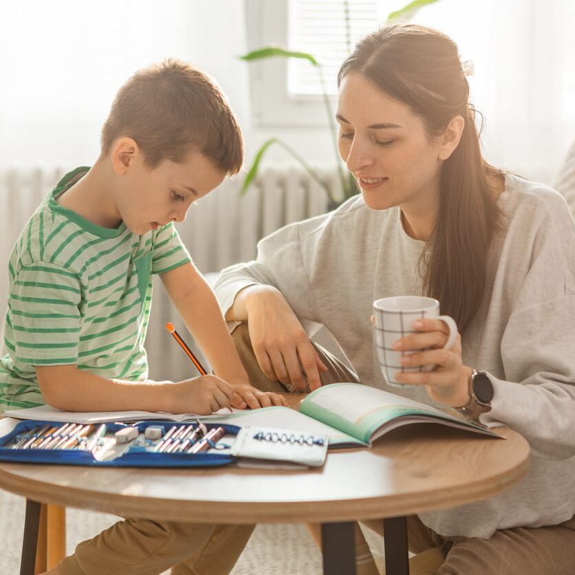 mother and son doing crafts